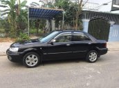 Chính chủ bán Ford Laser Deluxe 1.6 đời 2003, màu đen