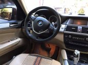 Cần bán BMW X6 2010 màu đỏ full option, odo 37.000km