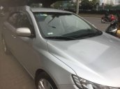 Cần bán gấp Kia Forte đời 2011, màu bạc số sàn