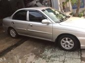 Bán xe Kia Spectra đời 2004, màu bạc, 135 triệu