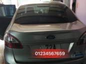 Gia đình bán Ford Fiesta đời 2011, màu vàng cát