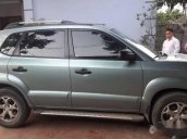 Cần bán xe Hyundai Tucson 2009, màu xanh 