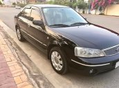 Bán ô tô Ford Laser GHIA 1.8 MT đời 2004, màu đen xe gia đình, giá chỉ 225 triệu