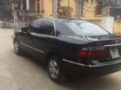 Cần bán gấp Mazda 626 sản xuất năm 1999, màu đen, 130tr