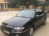 Cần bán gấp Mazda 626 sản xuất năm 1999, màu đen, 130tr