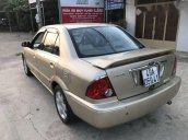 Bán Ford Laser đời 2003, màu vàng cát