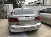 Bán ô tô Mazda 3 năm sản xuất 2004, màu bạc 