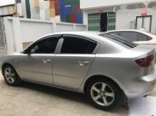 Bán ô tô Mazda 3 năm sản xuất 2004, màu bạc 