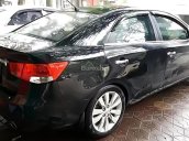 Cần bán Kia Forte SLi 1.6 AT năm 2010, màu đen, xe nhập chính chủ