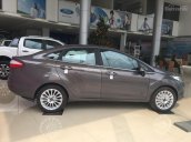 Bán xe Ford Fiesta 1.5 Titanium sedan 4 cửa màu nâu hổ phách, giao xe ngay, hỗ trợ trả góp tới 90%