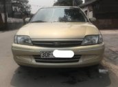 Cần bán lại xe Ford Laser Deluxe sản xuất năm 2002, màu vàng