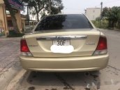 Cần bán lại xe Ford Laser Deluxe sản xuất năm 2002, màu vàng