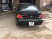 Cần bán xe Kia Spectra năm sản xuất 2003, màu đen