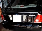 Bán xe Ford Laser GHIA 1.8 AT đời 2005, màu đen 