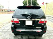 Cần bán lại xe Toyota Fortuner màu đen xe gia đình, 568tr