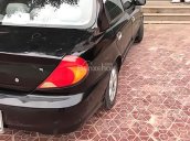 Cần bán xe Kia Spectra 2003, màu đen như mới