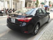 Cần bán xe Toyota Corolla altis 1.8G đời 2015, màu đen