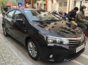 Cần bán xe Toyota Corolla altis 1.8G đời 2015, màu đen