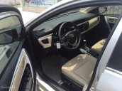 Cần bán Toyota Corolla Altis 1.8G 2015, màu xám bạc