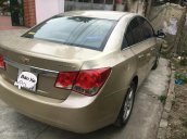 Cần bán xe Chevrolet Cruze đời 2011 màu vàng, giá 312 triệu