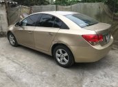 Cần bán xe Chevrolet Cruze đời 2011 màu vàng, giá 312 triệu