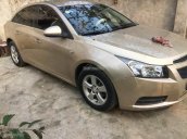 Cần bán xe Chevrolet Cruze đời 2011 màu vàng, giá 312 triệu