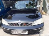 Cần bán lại xe Ford Laser năm sản xuất 2003, màu đen, 155tr