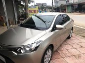 Cần bán xe Toyota Vios E 2017, màu vàng