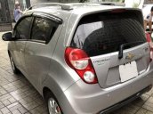 Bán xe Chevrolet Spark AT sản xuất 2014, màu bạc đẹp như mới