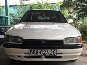 Cần bán gấp Mazda 323 1.6 MT năm 2001, màu trắng