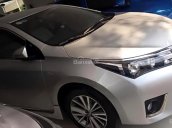 Cần bán xe Toyota Corolla Altis 1.8G AT đời 2015, màu bạc số tự động