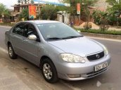 Cần bán Toyota Corolla Altis đời 2002, màu bạc xe gia đình