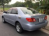 Cần bán Toyota Corolla Altis đời 2002, màu bạc xe gia đình