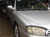 Bán xe Kia Spectra đời 2004, màu bạc, 135 triệu