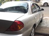 Bán xe Kia Spectra đời 2004, màu bạc, 135 triệu