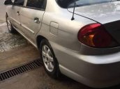 Bán xe Kia Spectra đời 2004, màu bạc, 135 triệu