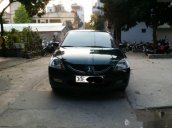 Cần bán gấp Mitsubishi Lancer AT đời 2003