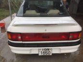 Cần bán gấp Mazda 323 sản xuất 1996, màu trắng