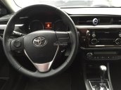 Cần bán Toyota Corolla altis 1.5G 2015, màu nâu số tự động