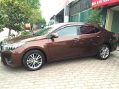 Cần bán Toyota Corolla altis 1.5G 2015, màu nâu số tự động