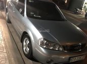 Cần bán lại xe Ford Laser LXi 1.6 MT 2004, màu bạc