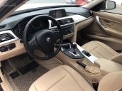 Cần bán BMW 320i 2012, màu trắng, nhập khẩu, chính chủ