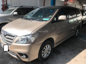 Cần bán xe Toyota Innova 2.0 E đời 2014, màu vàng cát gốc SG bao đẹp