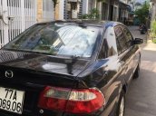 Bán ô tô Mazda 626 năm sản xuất 2001, màu đen  