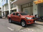 Bán xe Toyota Hilux 2.5E sản xuất năm 2016, màu cam, giá tốt