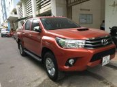 Bán xe Toyota Hilux 2.5E sản xuất năm 2016, màu cam, giá tốt