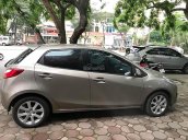 Bán ô tô Mazda 2 S năm sản xuất 2014, màu vàng giá cạnh tranh