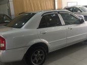 Cần bán gấp Mazda 323 MT sản xuất 2003, màu bạc