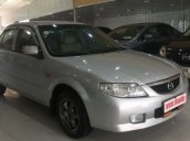 Cần bán gấp Mazda 323 MT sản xuất 2003, màu bạc