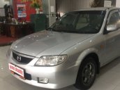 Cần bán gấp Mazda 323 MT sản xuất 2003, màu bạc